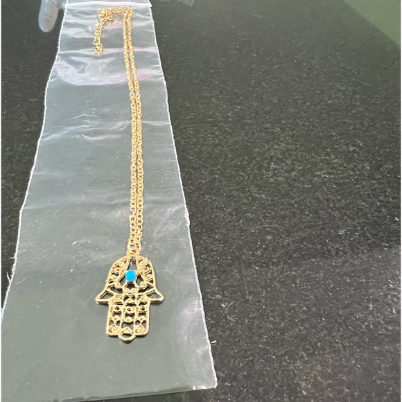 HAMSA IN GOLD TONE FILIGREE WITH A TURQUOISE COLORED STONE - Picture 3 of 8